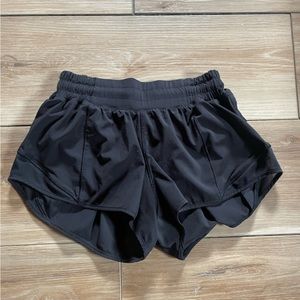 Lululemon size 2 black hotty hots. 2.5 in, low rise. Worn 2 times!